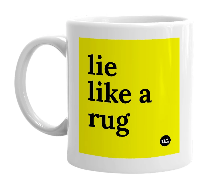 White mug with 'lie like a rug' in bold black letters