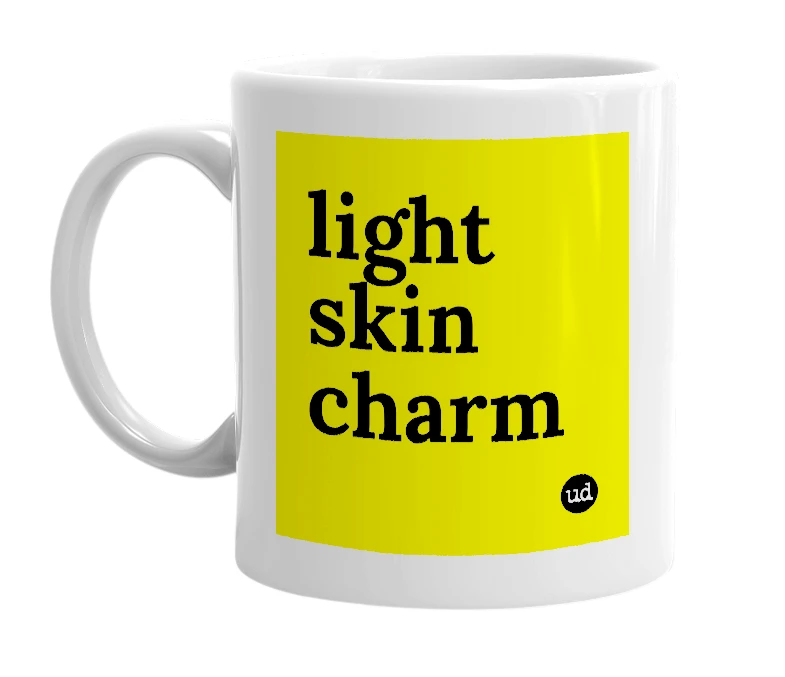 White mug with 'light skin charm' in bold black letters