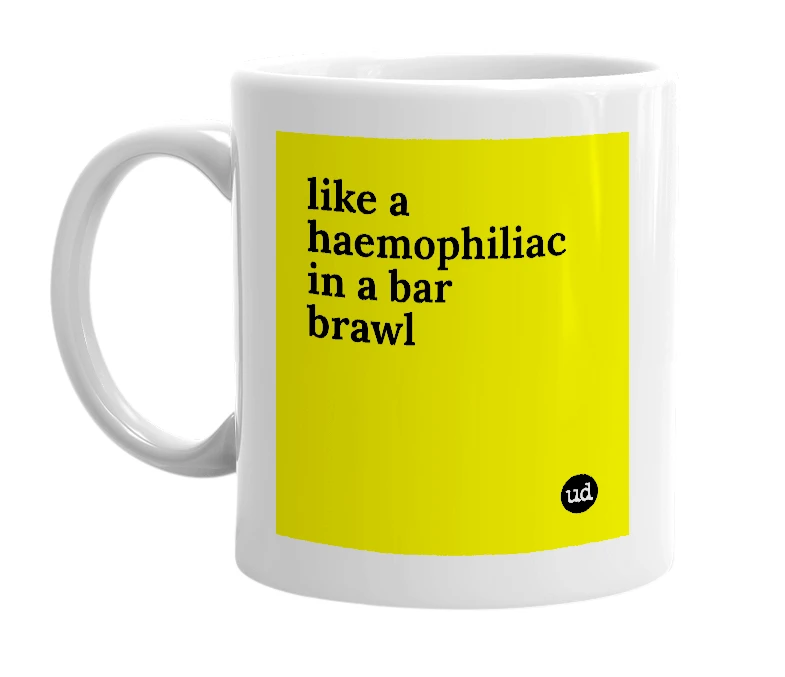 White mug with 'like a haemophiliac in a bar brawl' in bold black letters