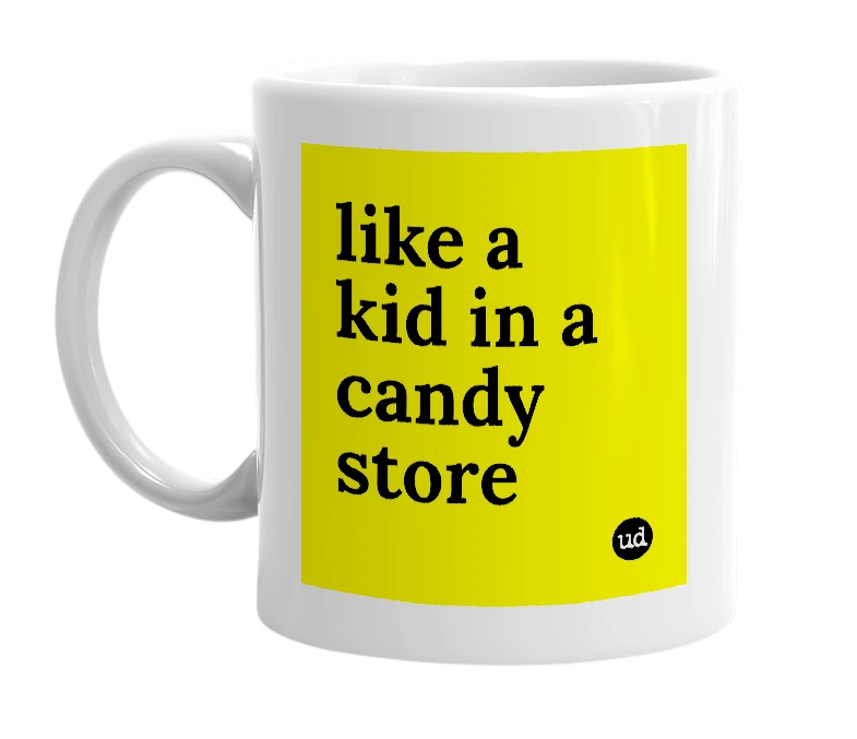 White mug with 'like a kid in a candy store' in bold black letters