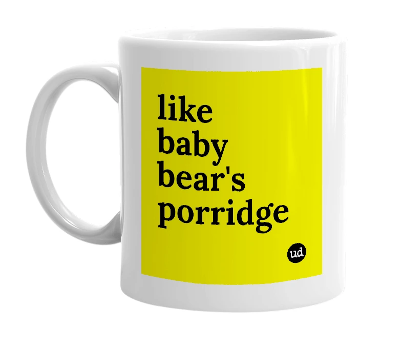 White mug with 'like baby bear's porridge' in bold black letters