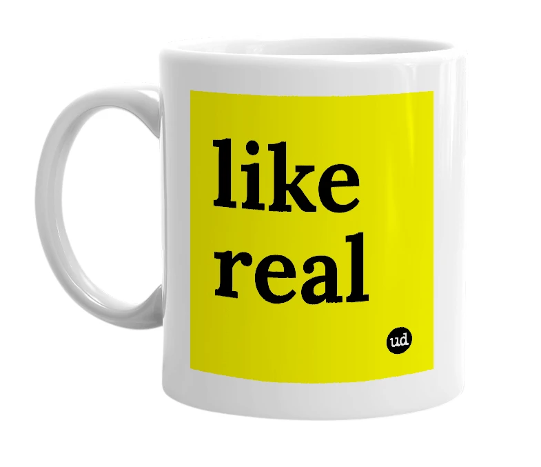 White mug with 'like real' in bold black letters