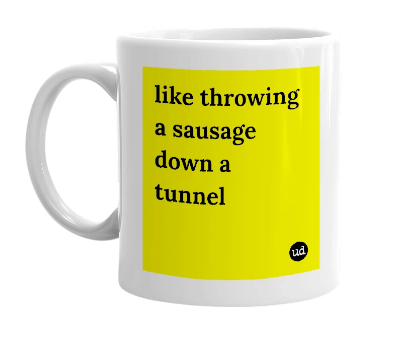White mug with 'like throwing a sausage down a tunnel' in bold black letters