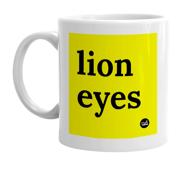 White mug with 'lion eyes' in bold black letters