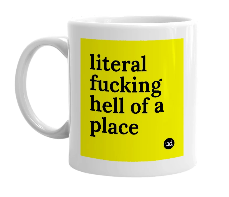 White mug with 'literal fucking hell of a place' in bold black letters