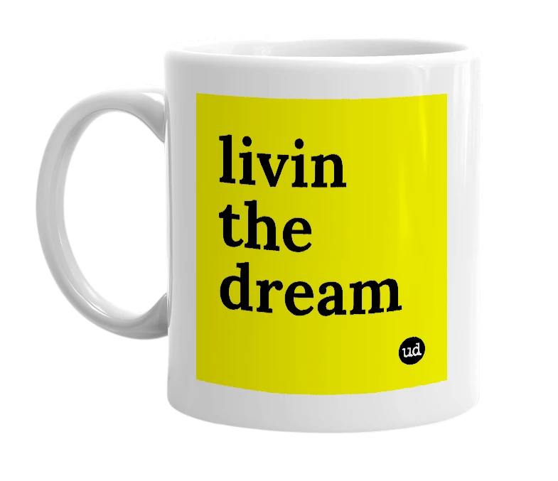 White mug with 'livin the dream' in bold black letters