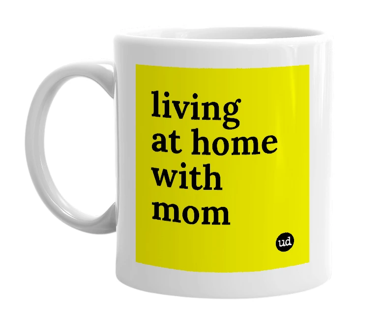 White mug with 'living at home with mom' in bold black letters