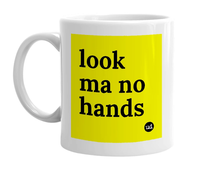 White mug with 'look ma no hands' in bold black letters