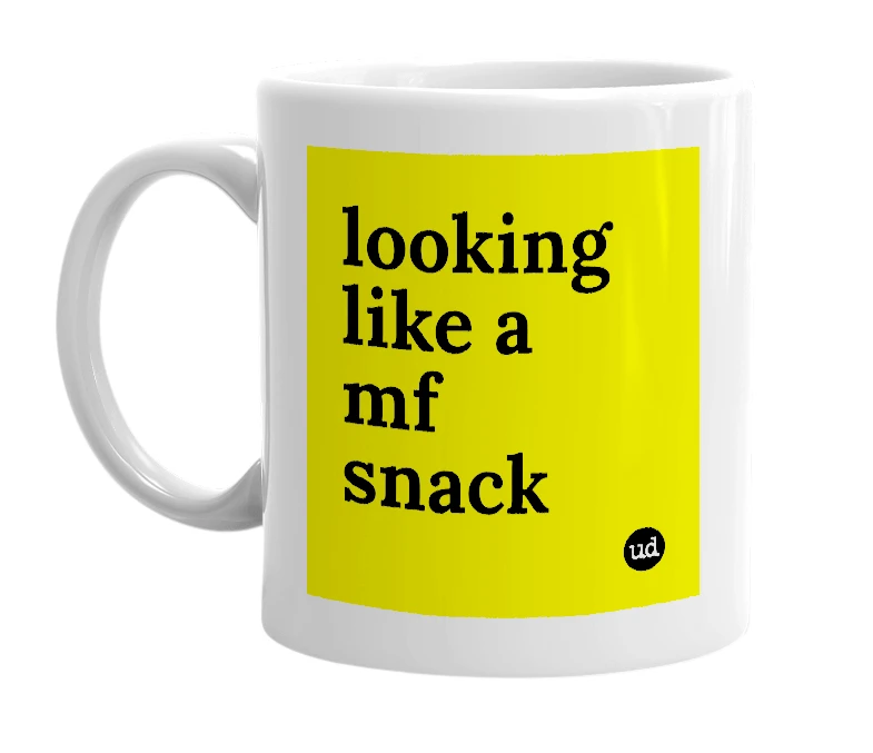 White mug with 'looking like a mf snack' in bold black letters