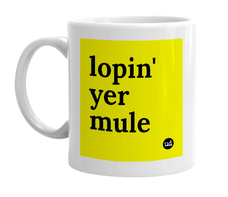 White mug with 'lopin' yer mule' in bold black letters