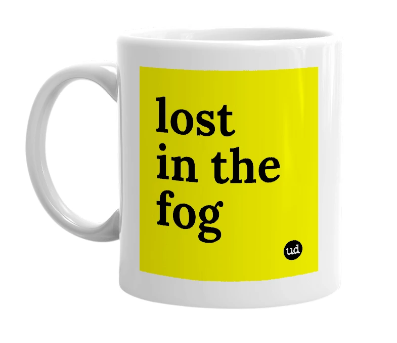 White mug with 'lost in the fog' in bold black letters