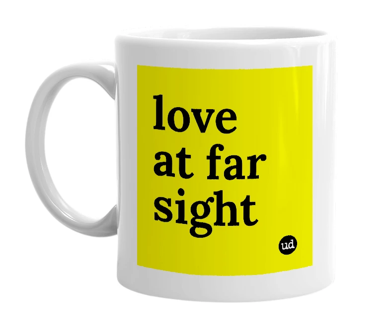 White mug with 'love at far sight' in bold black letters