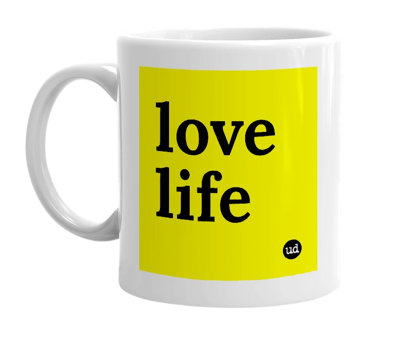 White mug with 'love life' in bold black letters