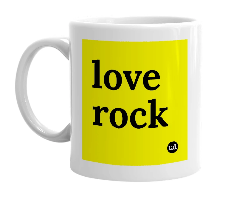 White mug with 'love rock' in bold black letters