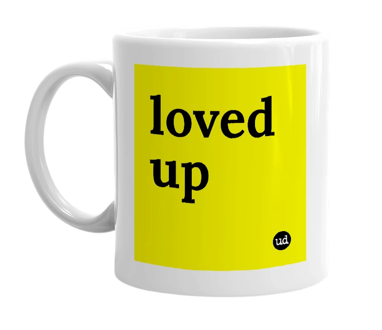 White mug with 'loved up' in bold black letters