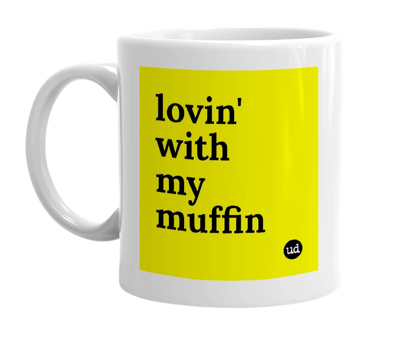 White mug with 'lovin' with my muffin' in bold black letters