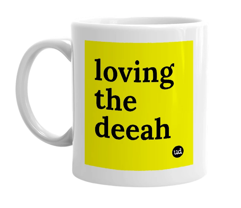 White mug with 'loving the deeah' in bold black letters