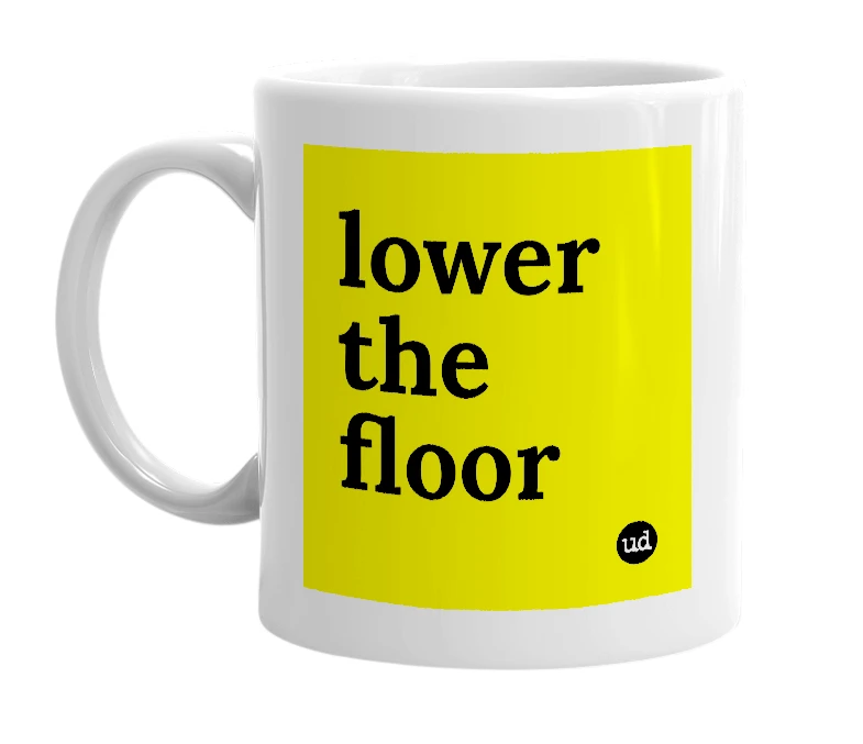 White mug with 'lower the floor' in bold black letters