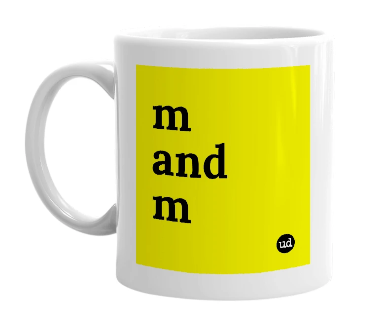 White mug with 'm and m' in bold black letters