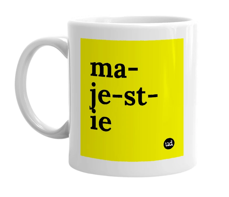 White mug with 'ma-je-st-ie' in bold black letters