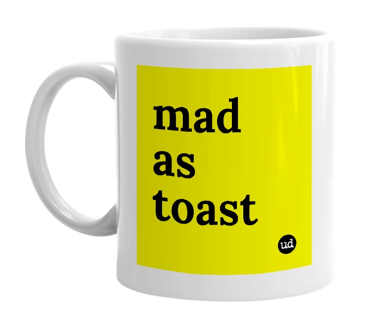 White mug with 'mad as toast' in bold black letters