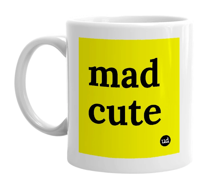 White mug with 'mad cute' in bold black letters