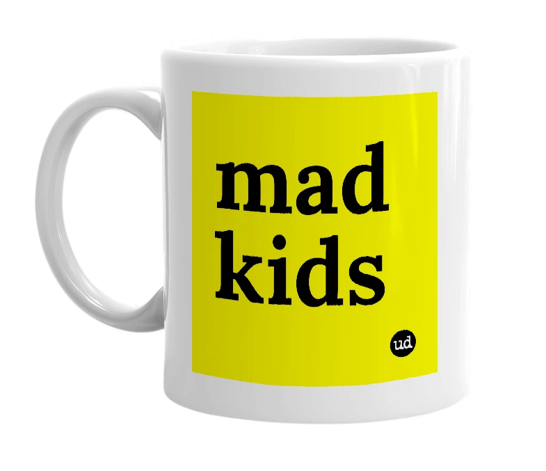 White mug with 'mad kids' in bold black letters
