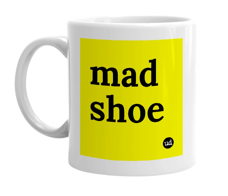 White mug with 'mad shoe' in bold black letters