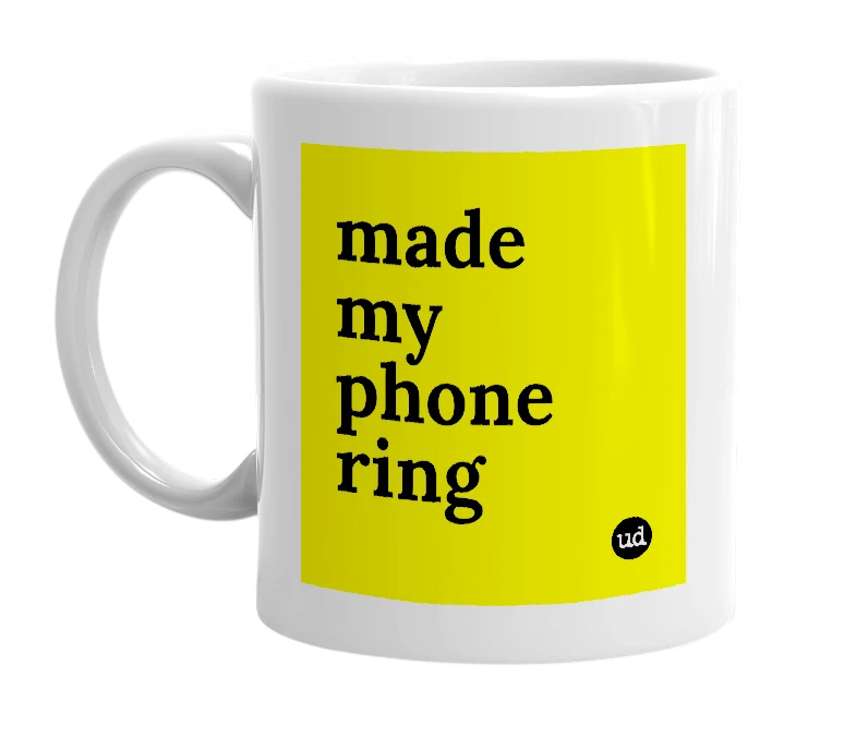 White mug with 'made my phone ring' in bold black letters