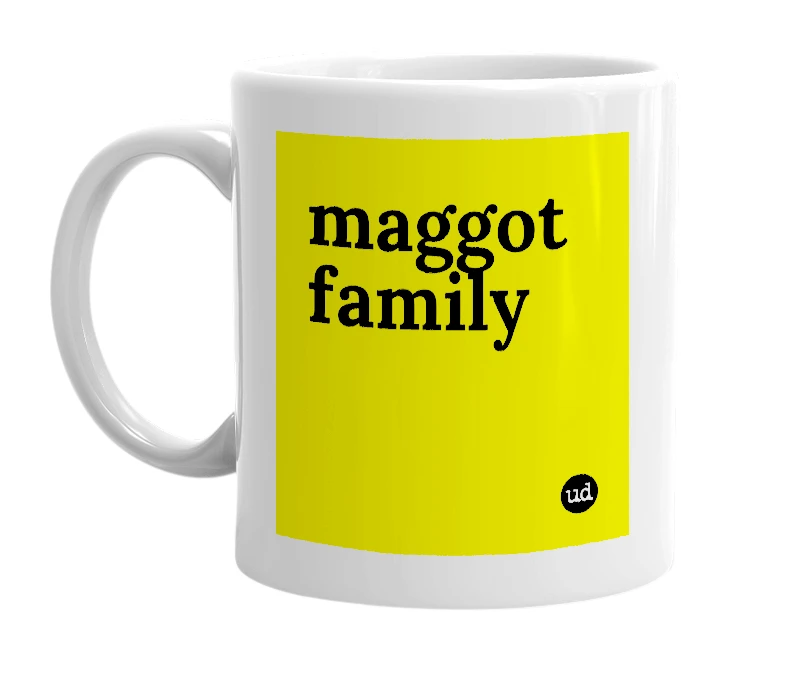 White mug with 'maggot family' in bold black letters