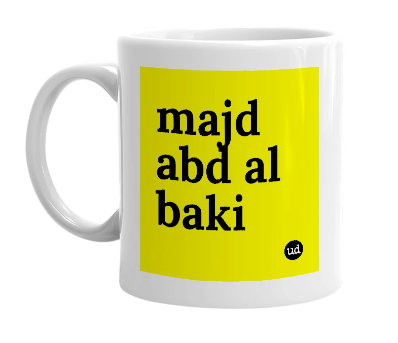 White mug with 'majd abd al baki' in bold black letters