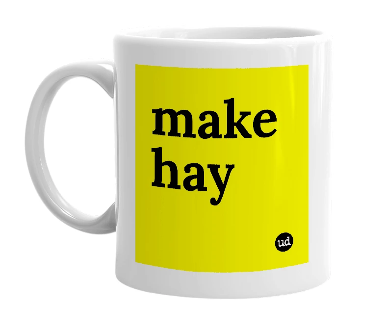 White mug with 'make hay' in bold black letters