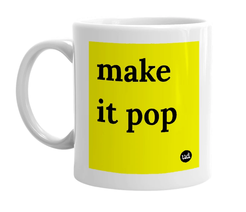 White mug with 'make it pop' in bold black letters