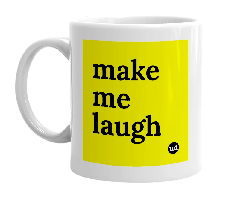White mug with 'make me laugh' in bold black letters