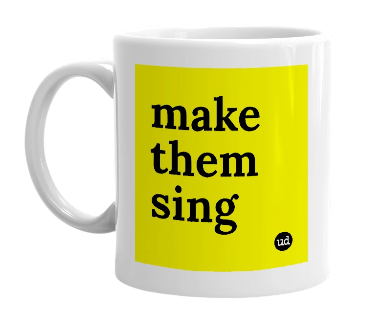 White mug with 'make them sing' in bold black letters
