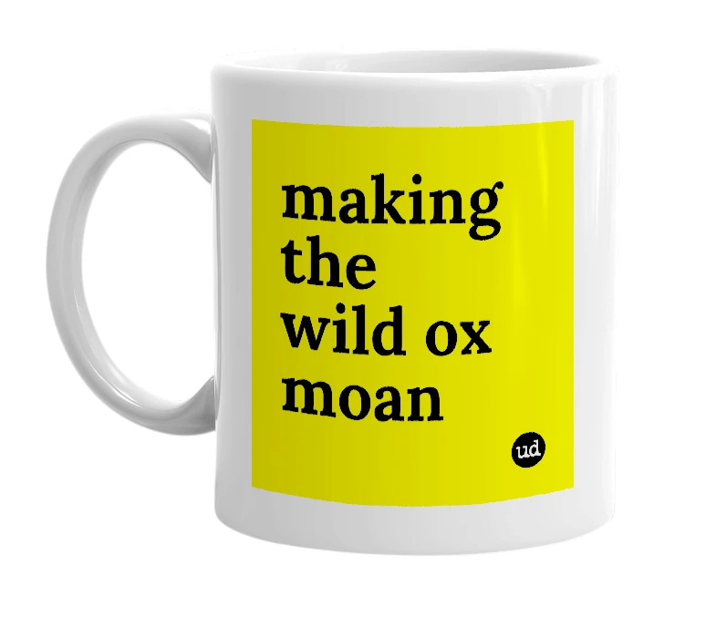 White mug with 'making the wild ox moan' in bold black letters