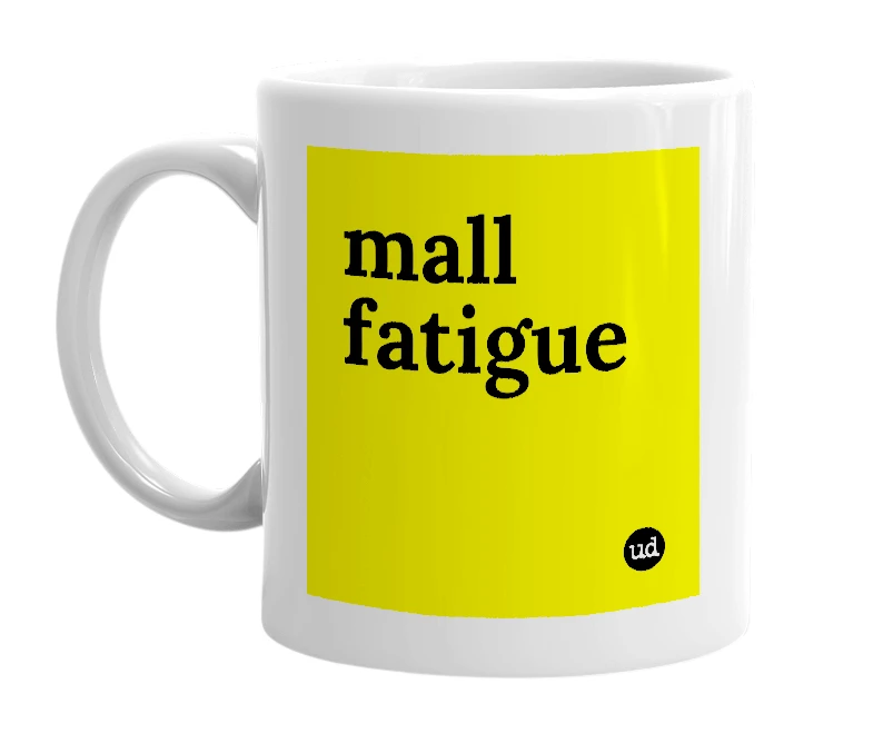 White mug with 'mall fatigue' in bold black letters