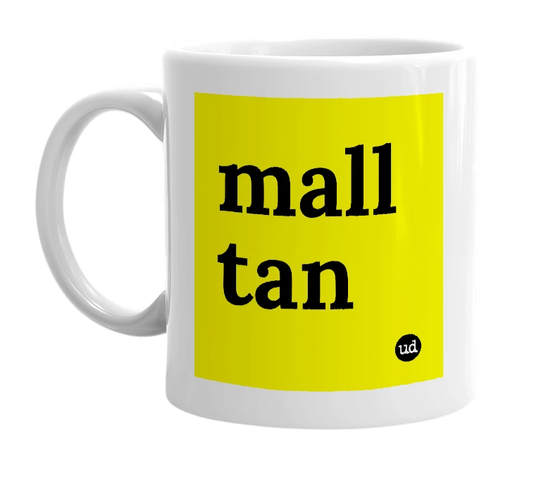 White mug with 'mall tan' in bold black letters