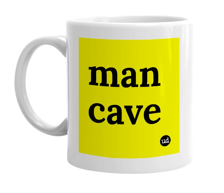 White mug with 'man cave' in bold black letters