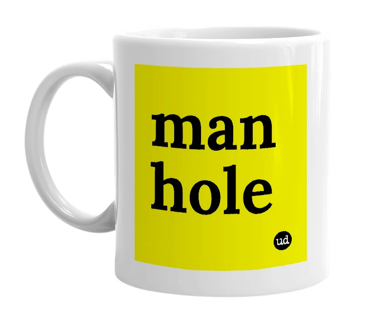 White mug with 'man hole' in bold black letters