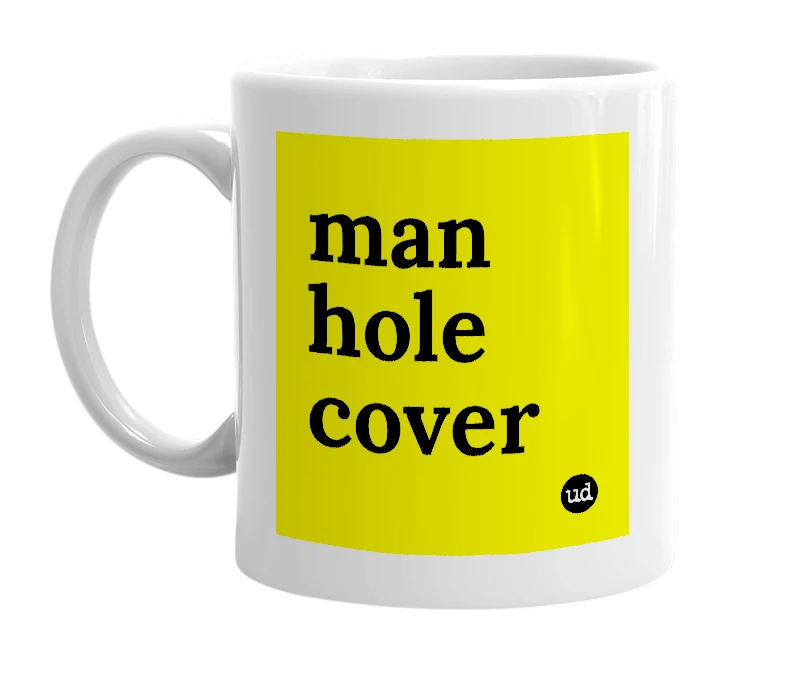 White mug with 'man hole cover' in bold black letters