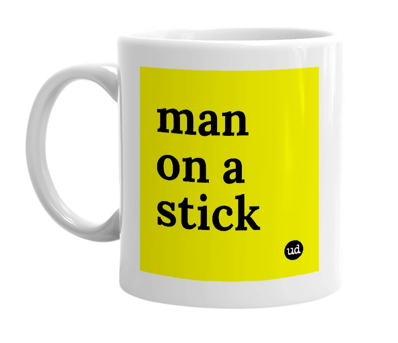 White mug with 'man on a stick' in bold black letters