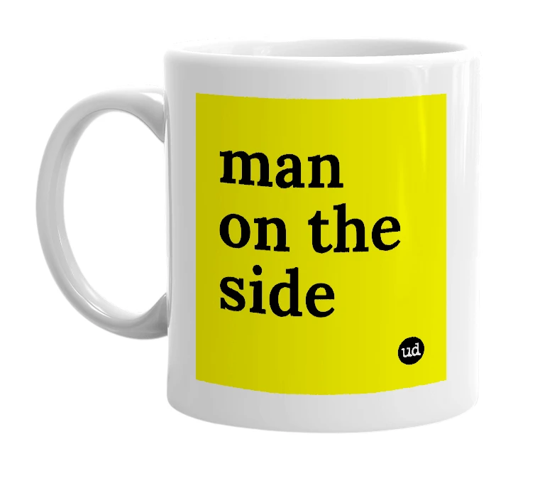 White mug with 'man on the side' in bold black letters