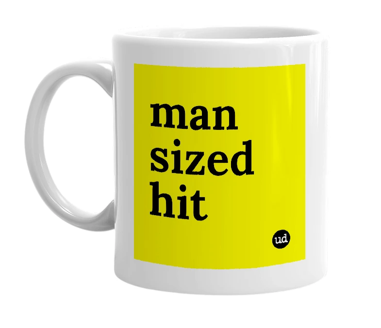 White mug with 'man sized hit' in bold black letters