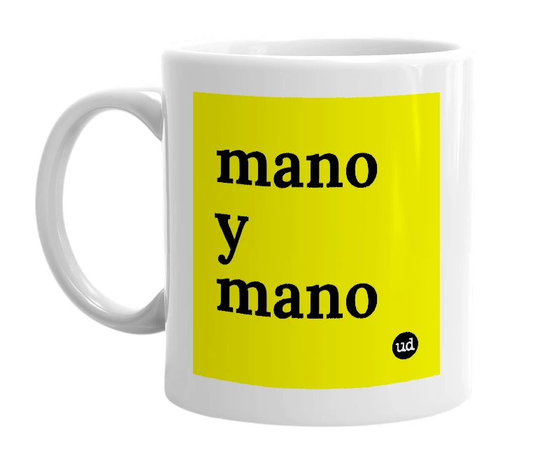 White mug with 'mano y mano' in bold black letters