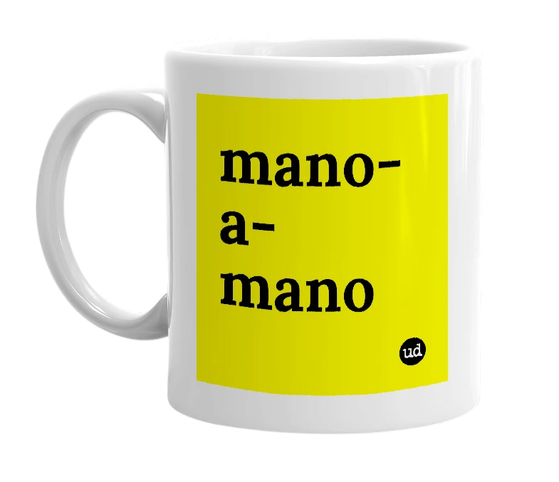 White mug with 'mano-a-mano' in bold black letters