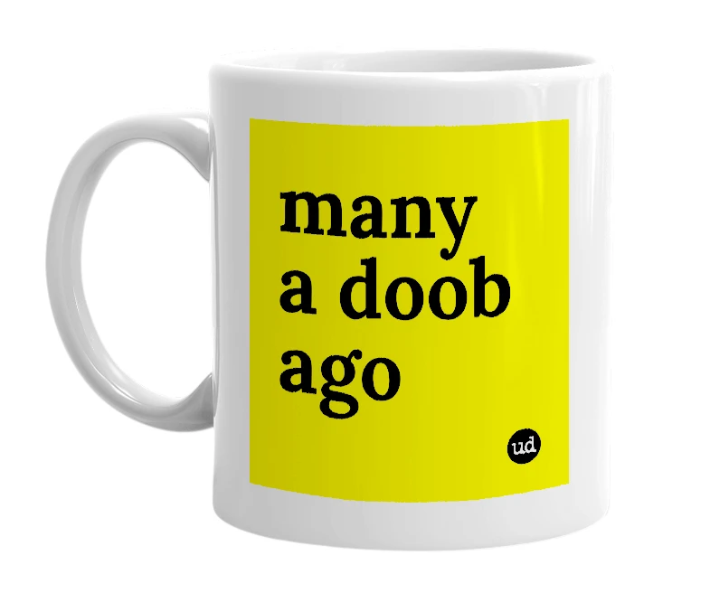 White mug with 'many a doob ago' in bold black letters