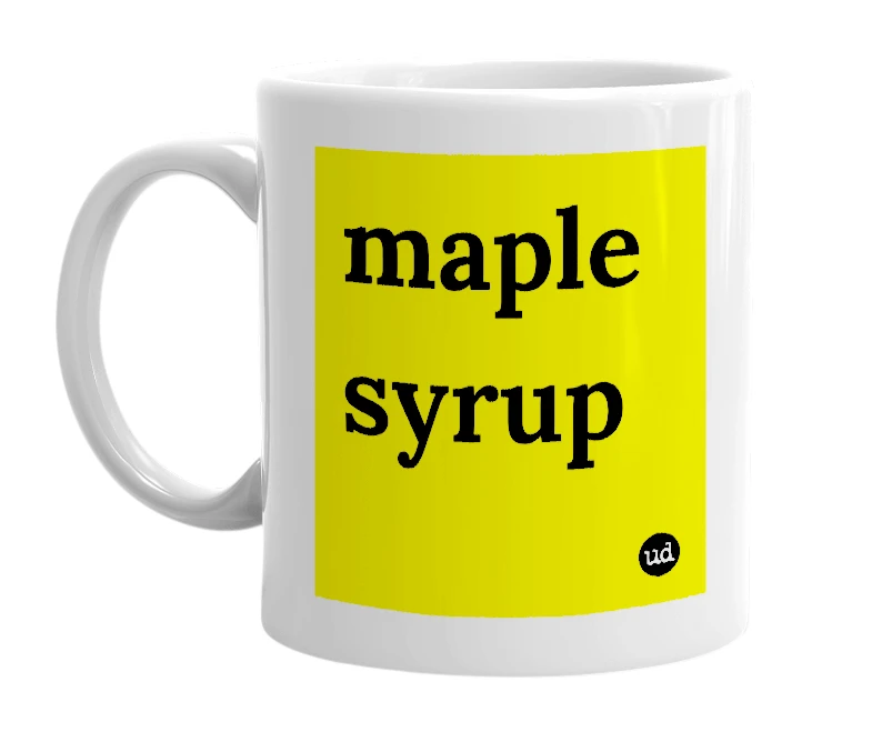 White mug with 'maple syrup' in bold black letters