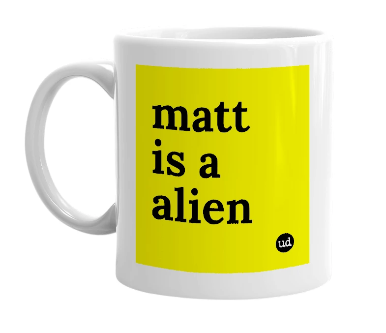 White mug with 'matt is a alien' in bold black letters