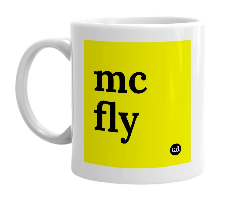 White mug with 'mc fly' in bold black letters